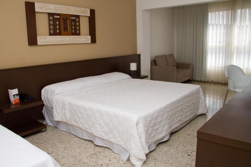 Santorini Hotel Guanhaes Phòng bức ảnh